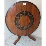 A 19th century marquetry inlaid mahogany and ebonised miniature circular table,