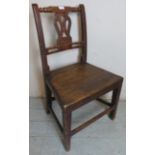 An early 19th century country made fruitwood single chair.