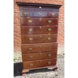 A George III mahogany chest on chest, the dentil moulded cornice above blind fret frieze,