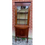 An Edwardian boxwood strung mahogany tall display cabinet with glazed panelled upper section having