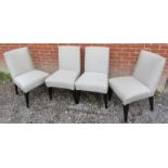 A contemporary set of four dining chairs