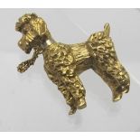 An 18ct gold 'poodle' dog brooch with ga
