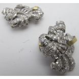 A pair of diamond chip brooches, circa 1