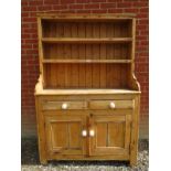A 19th century country pine dresser all