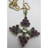 A gem and emerald cruciform pendant circ