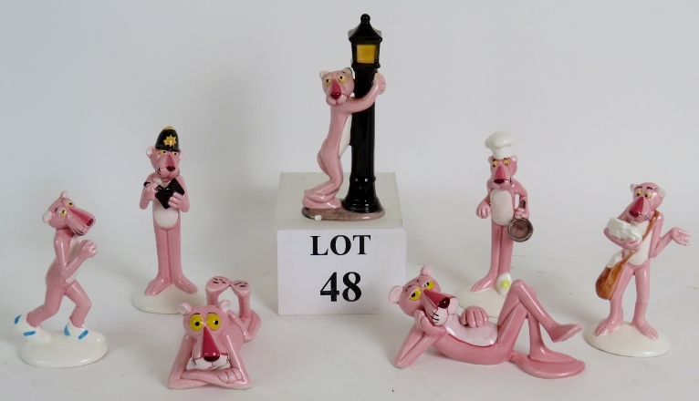 Seven 1980's ceramic Pink Panther figure