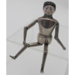 A white metal jointed peg doll pepper, w