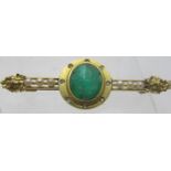 A French emerald and bouton pearl brooch