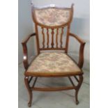 An elbow chair with tapestry seat and ba