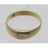 An 18ct yellow gold 'gypsy' ring, set wi