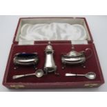 A three piece silver condiment set, to i