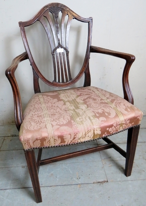 A Hepplewhite style mahogany elbow chair
