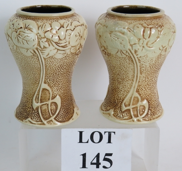 A pair of Art Nouveau Bretby Pottery Cla