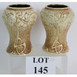 A pair of Art Nouveau Bretby Pottery Cla