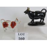Two pottery Staffordshire Style cow crea