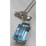 An aquamarine pendant, the rectangular s