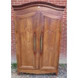 An 18th century French fruitwood armoire