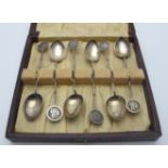 A set of six white metal Chinese teaspoo