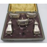 A five piece silver condiment set, compr