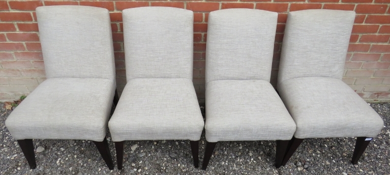 A contemporary set of four dining chairs