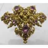 A 19th century gold and pink topaz brooc