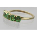 A Kenyon 14ct yellow gold Tsavorite garn