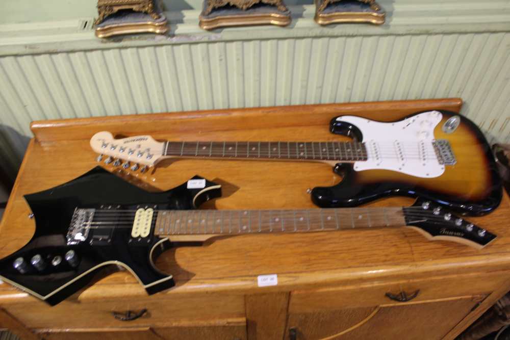 TWO ELECTRIC GUITARS one bearing the brand name, Fender