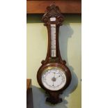 A CARVED OAK BACKED BANJO BAROMETER THERMOMETER with presentation plaque