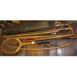 A SELECTION OF VINTAGE WALKING STICKS AND CANES, some having silver mounts, together with an