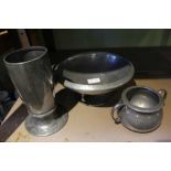 THREE PIECES OF HAMMERED PEWTER WARES, two marked "Tudric" for retail through Liberty's of London