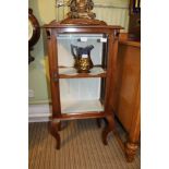 A SCRATCH BUILT MAHOGANY FRAMED GLAZED DISPLAY CABINET with single door, having upholstered