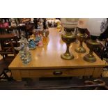 A GOOD QUALITY OAK DINING TABLE having cutlery drawers to either end, raised on four turned legs