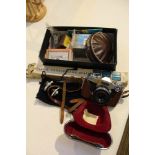 A BAG CONTAINING A SELECTION OF VINTAGE CAMERAS AND ACCESSORIES