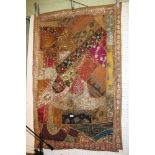 A HIGHLY DECORATIVE INDIAN BEAD SHELL & SEQUIN EMBROIDERED PATCHWORK THROW
