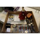 A TRAY OF COLLECTABLE ITEMS to include; wristwatches, medals, costume jewellery and a Doulton figure