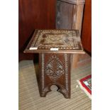 A SMALL CARVED SQUARE TOP STOOL / DISPLAY STAND
