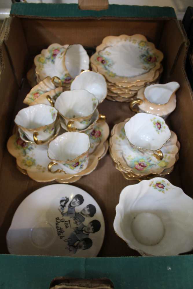 A BOX CONTAINING A VICTORIAN FLUTED PORCELAIN PART TEA SERVICE of apricot ground, together with a "