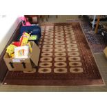 A RAW UMBER & RUSSET COLOURED WOVEN FLOOR RUG with multi-guard border