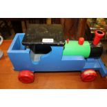A PAINTED WOODEN CHILD'S TOY STEAM TRAIN