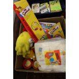 A BOX CONTAINING A LARGE SELECTION OF SIMPSONS BRANDED ITEMS