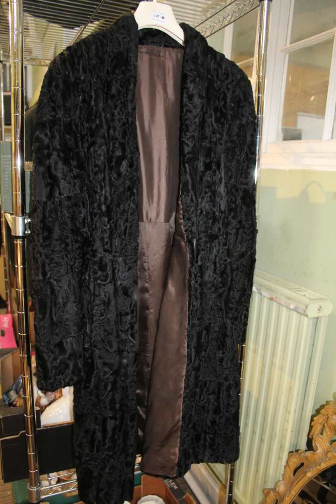 A LADIES PERSIAN LAMB LONG COAT