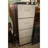 A TWO TONE STEEL FOUR DRAWER FREE-STANDING FILING CABINET