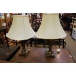 A PAIR OF BRUSHED BRASS EFFECT TABLE LAMPS