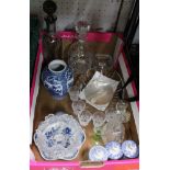 A BOX CONTAINING A SELECTION OF DOMESTIC BLUE & WHITE DECANTERS & STOPPERS ETC.