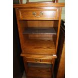A PAIR OF OAK FINISHED BEDSIDE UNITS with single drawers over storage recess
