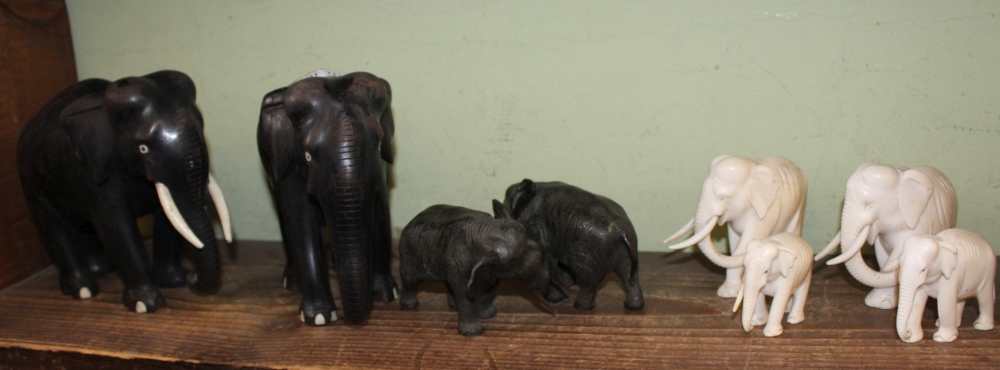 A HERD OF ELEPHANTS IN A VARIETY OF MEDIUM, being metal, wood and acrylic