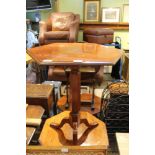 A LATE 19TH CENTURY MAHOGANY HEXAGONAL TOPPED OCCASIONAL TABLE on faceted column and three downswept