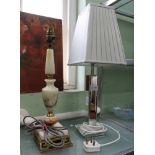 AN ART DECO DESIGNED MIRRORED TABLE LAMP together with an onyx and brass mounted table lamp