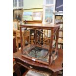 A BAMBOO SQUARE TOPPED COFFEE TYPE TABLE with parquetry design top