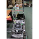 A HAYTER HARRIER 56 PRO PETROL DRIVEN MOWER with grass collection box instructions